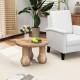 Small solid mahogany wood coffee table with thickened top and column legs, shown in a cozy living room setting.