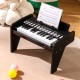 25-key black kids piano keyboard with adjustable speed and volume, perfect for toddlers aged 3+, featuring sturdy legs.