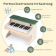 25-key kids piano keyboard in green with removable music stand, designed for safe, screen-free musical learning.