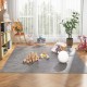 Gray wood grain foam floor mats arranged in a play area, ideal for children's activities and soft flooring.