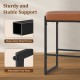 Close-up of the sturdy metal frame and adjustable foot pads of the 26-inch bar stools set for kitchen islands.