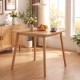 Square bamboo dining table for 2-4 people, featuring a natural finish and sturdy frame, perfect for compact spaces.