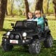Black 12V 2-seater ride-on car with remote control, featuring storage space and LED lights for outdoor fun.