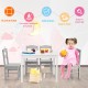 Kids 5-piece wooden table and chair set in white, perfect for playroom activities, featuring rounded corners for safety.