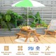 Kids outdoor picnic table with green umbrella, made of durable fir wood, perfect for sand and water play in the yard.