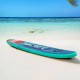 10-foot inflatable stand-up paddleboard on the beach, featuring a non-slip deck and bungee cords for secure storage.