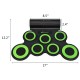 Electronic roll-up drum pad set with 7 sensitive-touch pads, green accents, and dual speakers for portable music.