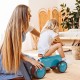 Baby balance bike in blue with 4 wheels, designed for 10-24 months, promoting coordination and balance.