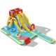 Inflatable 7-in-1 water park with dual slides, pool, basketball hoop, and climbing wall for kids' outdoor fun.