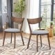 Set of 2 dining chairs with upholstered curved backs and rubber wood legs, perfect for kitchen or dining room elegance.