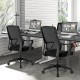 Modern breathable mesh chair with curved backrest and armrest, adjustable height, ideal for comfortable office use.
