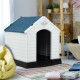Durable plastic waterproof pet house with a blue roof, providing a safe and comfortable shelter for dogs indoors or.