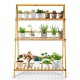 3-tier bamboo foldable plant stand showcasing potted plants, ideal for indoor and outdoor display and organization.