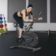Magnetic exercise bike with adjustable seat and handle, featuring LCD panel and sturdy steel frame for home workouts.