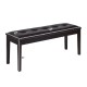 Upholstered dining room bench with button tufting, solid rubberwood legs, and cushioned seat for versatile use.