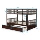 Full over full bunk bed in brown wood with trundle, featuring sturdy slats and high guardrails for safety.