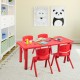 Kids plastic rectangular learn and play table in red with four chairs, ideal for preschools and home use.