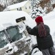 Telescoping snow roof rake with large blade, adjustable length, and non-slip handle, ideal for removing snow from.