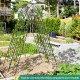 Metal garden trellis with elegant arch top, ideal for climbing plants and customizable layouts in outdoor gardens.