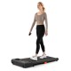 Compact 2.5HP under desk treadmill in black, featuring remote control and anti-slip running belt for home office use.