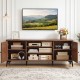 Mid-century modern 2-door TV stand in brown, featuring adjustable shelves and open compartments for versatile storage.