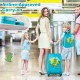 Close-up of the blue hardshell suitcase's smooth 2-way zippers and adjustable telescoping handle, designed for kids'.