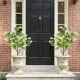 Two 39-inch artificial locust flower trees in decorative planters, featuring realistic white flowers for porch decor.