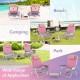 Two pink folding beach chairs with adjustable positions and a side table, ideal for camping and outdoor relaxation.