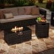 Outdoor rattan fire table set featuring a 32-inch gas firepit with a black tempered glass top for elegant outdoor.