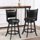 Black swivel counter stools with upholstered seats, rubber wood construction, perfect for dining or bar areas.
