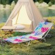 Adjustable beach recliner in pink floral design with metal frame, perfect for camping or poolside relaxation.