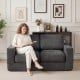 Black 2-seater floor couch loveseat with removable corduroy cover, ideal for cozy lounging in small spaces.