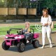 Pink kids ride-on dump truck with tiltable bed and remote control, designed for two kids, ideal for outdoor adventures.