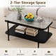Modern rectangular coffee table with gray sintered stone top and open storage shelf for everyday items in a stylish.