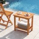 Acacia wood side table with slatted tabletop and storage shelf, perfect for patio or poolside use.