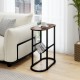 Narrow rustic brown end table with a sturdy steel frame, featuring a wide tabletop and storage bag, ideal for small.