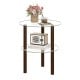 Round end table with a clear tempered glass top and brown rubber wood legs, perfect for displaying decor and essentials.