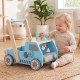 Blue truck-shaped wooden baby walker with adjustable speed, bottom storage, and rubber padded wheels for safe play.