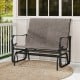 2-person outdoor glider bench with high backrest in brown, featuring ergonomic design and durable fabric for patio.