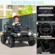 Kids ride-on truck in black with steering wheel, foot pedal, and LED headlights for safe outdoor fun.