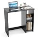 Modern black home office desk with 2 compartments, featuring a laptop, books, and decorative items for organized.