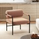 Velvet upholstered accent chair with cylindrical backrest and metal armrests, ideal for living room or home office use.