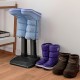 Electric shoe dryer with two removable tubes for drying boots and gloves, ideal for wet footwear on a flat surface.