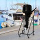 Outboard boat motor stand carrier cart with wheels, designed for easy storage and mobility for various boat motors.