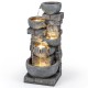 33" outdoor water fountain with LED lights, showcasing cascading bowls and a realistic stone texture for a tranquil.
