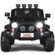 Black 12V 2-seater ride-on car truck with remote control, LED lights, and storage for kids' toys.
