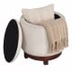 Beige 360° swivel velvet footrest with hidden storage, featuring a cozy blanket and pillow, perfect for living room use.