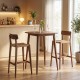36-inch walnut high top pub table with solid rubber wood legs, perfect for dining rooms or home bars.