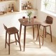 Counter height bar table with solid rubberwood legs in walnut finish, ideal for dining rooms or home bars.