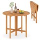 Round 36-inch outdoor folding dining table made of acacia wood, featuring a slatted tabletop, ideal for backyard.